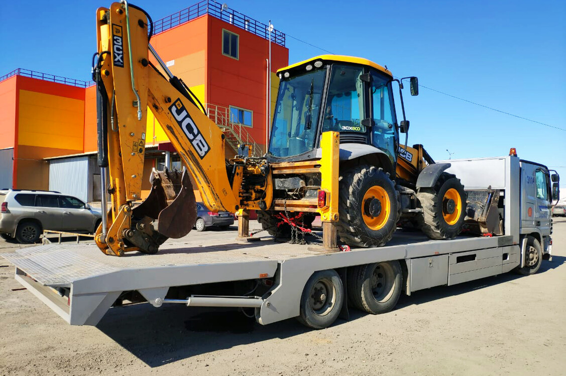 Перевозка спецтехники в Москве и области